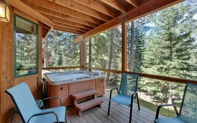Indoor heated pool, spacious deck, seven rooms with beds, hot tub, and more